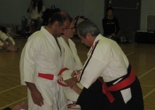 Belt tying ceremony performed by So Shihan Masayuki Hisataka
