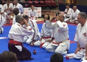 Sensei Manoli receiving 6th Dan in Kenkokan and 7th Dan in Koshiki