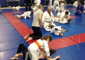Bully-proofing and karate class for parents and children. Beaconsfield Recreation Centre. Dec. 2017. Beautiful to see all these hard working kids and parents. We develop an 'Attitude' based training backed by technical knowledge of what to do if bullied. Sensei Manoli guiding his young students. Parents learn and encourage the children in the class.