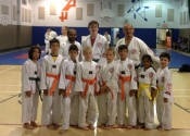 Congratulations - promoted to their belt level. Bottom row from L to R: Julian (green belt), Ian, Sean, Ethan, Owen, Joshua (orange belt), Saanvi & Luca (yellow belt). In the back row there is Maxime promoted to green belt. Keep up the good work. Practice bring improvement. June 2018. Beaconsfield Recreation Centre.