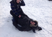 Not easy grappling in the snow with all that gear on. We were blessed with the beautiful Canadian weather. Beaconsfield Recreation Centre, Montreal, Qc. November 2018. www.manoli.ca.    Getting out of the guard.