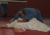 George presenting immobilisations on floor - Brown belt exam - Club de Judo Anjou