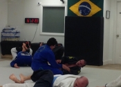 Holding on to dear life. Fighting the black belts is no easy feat. We are like minnows to these sharks. When you think you have the upper hand, you get tapped out from nowhere. They set the trap and you foolishly walk right into it. A humbling lesson. Palm Beach Gardens BJJ , Florida. Dec. 2018.