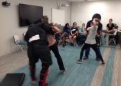 Morneau/Chepell 'hands-on', simulation oriented, women's self-defence workshop. Second group of wild, motivated and determined women. Downtown Montreal, Canada. Blindfolded attack.....BE ENRAGED - Oct. 2019