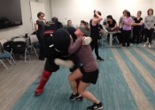 Morneau/Chepell 'hands-on', simulation oriented, women's self-defence workshop. Second group of wild, motivated and determined women. Downtown Montreal, Canada. Blindfolded attack.....BE ENRAGED - Oct. 2019