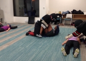 Morneau/Chepell 'hands-on', simulation oriented, women's self-defence workshop. Second group of wild, motivated and determined women. Downtown Montreal, Canada. Most attacks end up in a horizontal position (ground, bed, table...). Know what to do if brought to the ground. Get your legs between you and him. - Oct. 2019